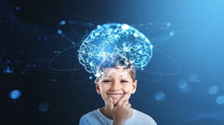108282225-1774364637082-Smiling_boy_with_illuminated_brain_network_above_h-2235333659-Getty
